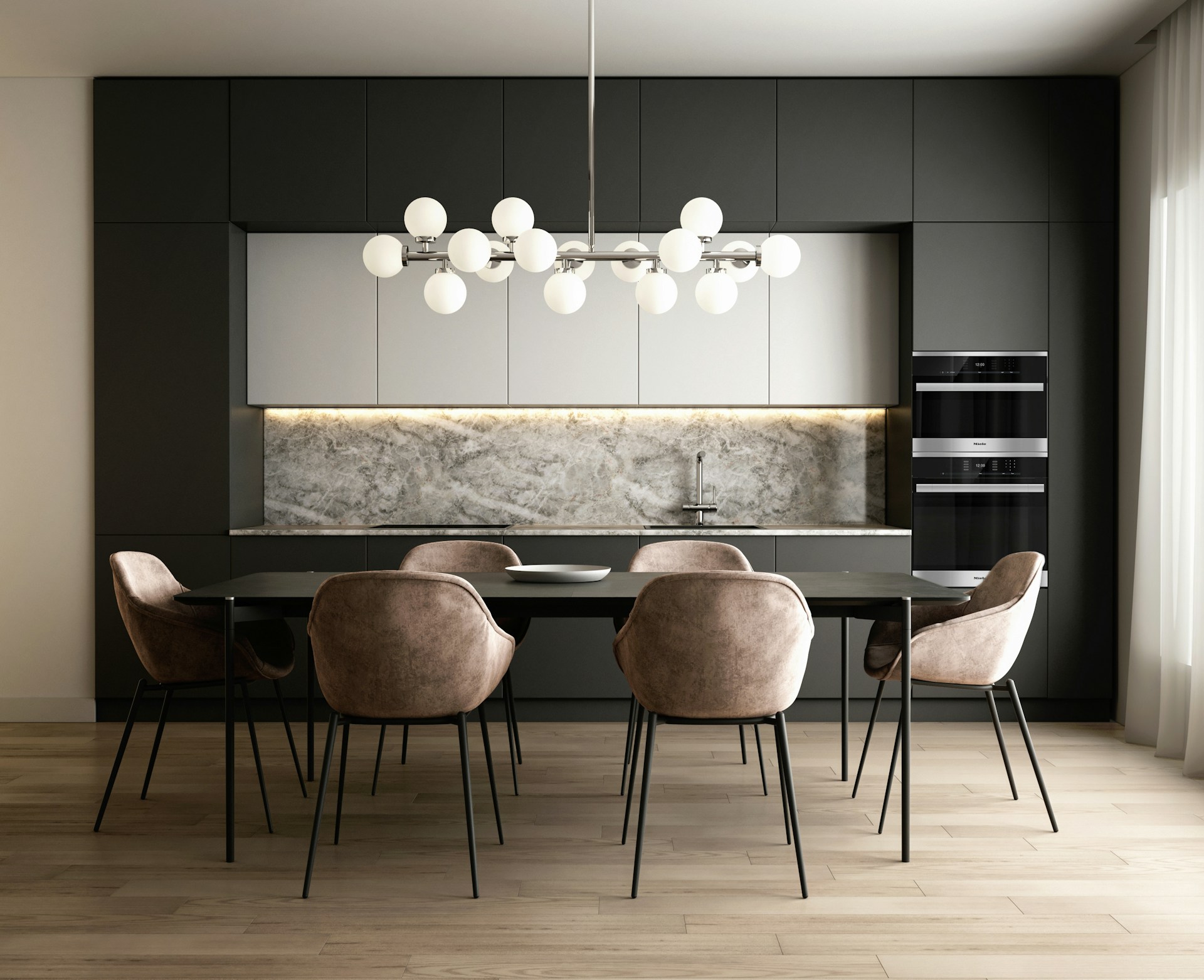Modern kitchen with dark cabinetry, marble backsplash, six brown upholstered chairs around a black dining table, and a contemporary chandelier.